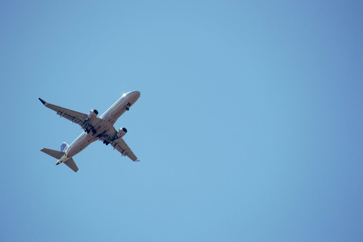 pic of airplane in blue sky