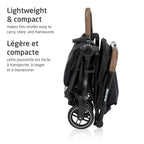 The compact, folded Maxi-Cosi stroller showcasing its ultra-light frame and space-saving design.