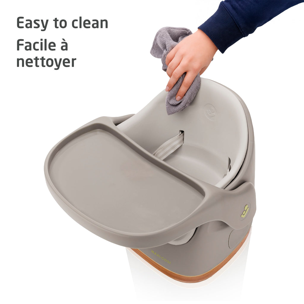 Demonstration of the smooth, wipeable surfaces and removable padded inlay, highlighting the stress-free, easy-to-clean design.