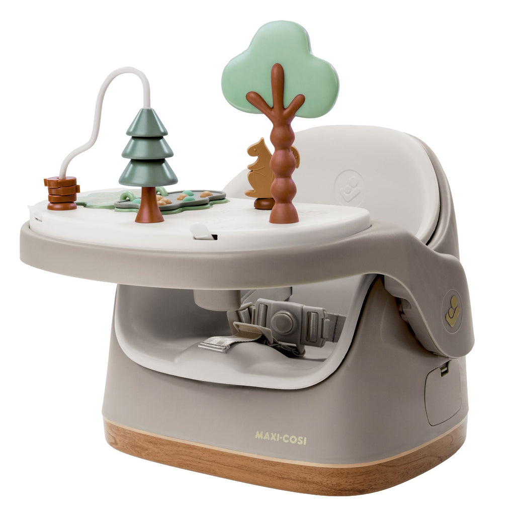 Modern 3-in-1 baby feeding booster floor seat & activity chair with toys in a neutral tone, shown on a clean white background.