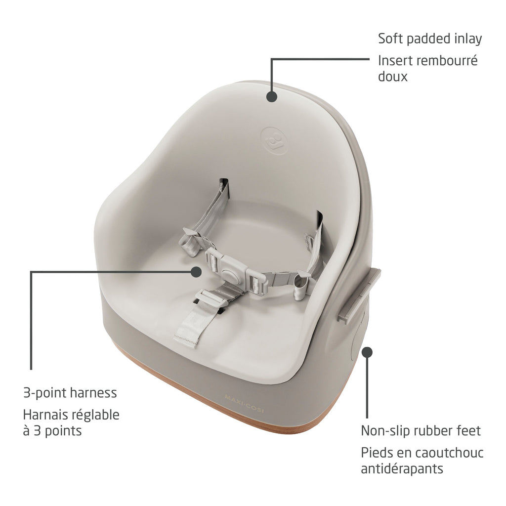 Detailed view of the soft padded seat inlay, the secure adjustable 3-point harness, and the stable non-slip rubber feet.