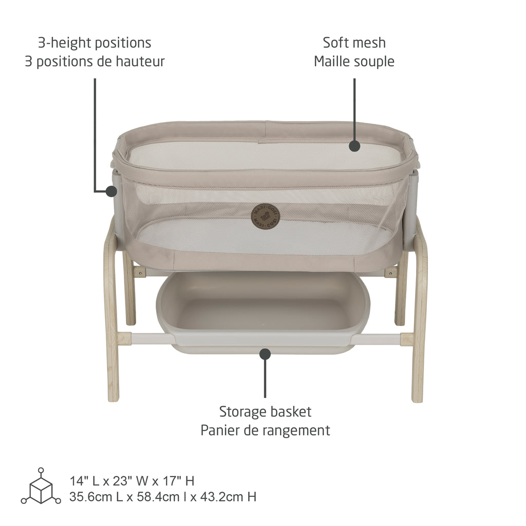 Feature callout diagram of the Iora doll bassinet showing 3-height positions, soft mesh sides, and lower storage basket.