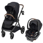 Front hero view of the Maxi-Cosi Oxford Essential Black modular travel system with Mico Luxe+ infant car seat on a clean white background, designed for Canadian families navigating city streets and beyond.