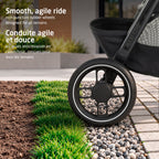 Close-up of the non-puncture all-terrain rubber wheels on grass and pavement for a smooth, agile ride.